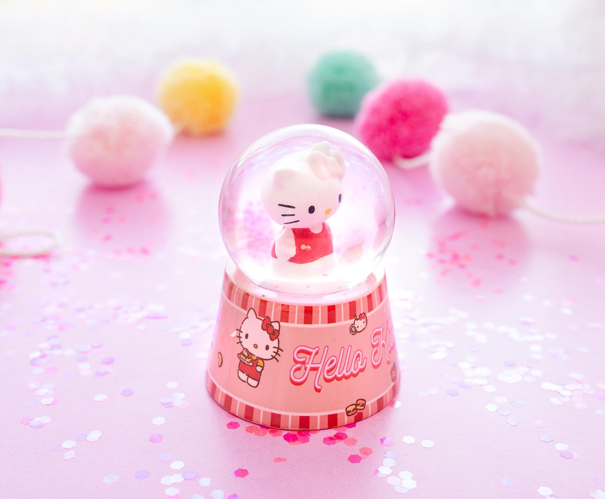 Sanrio Hello Kitty Mini Light-Up Snow Globe | 3 Inches Tall